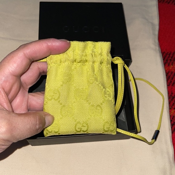 Gucci pouch preloved excellent condition color is yellow 100% Authentic. - Picture 8 of 9